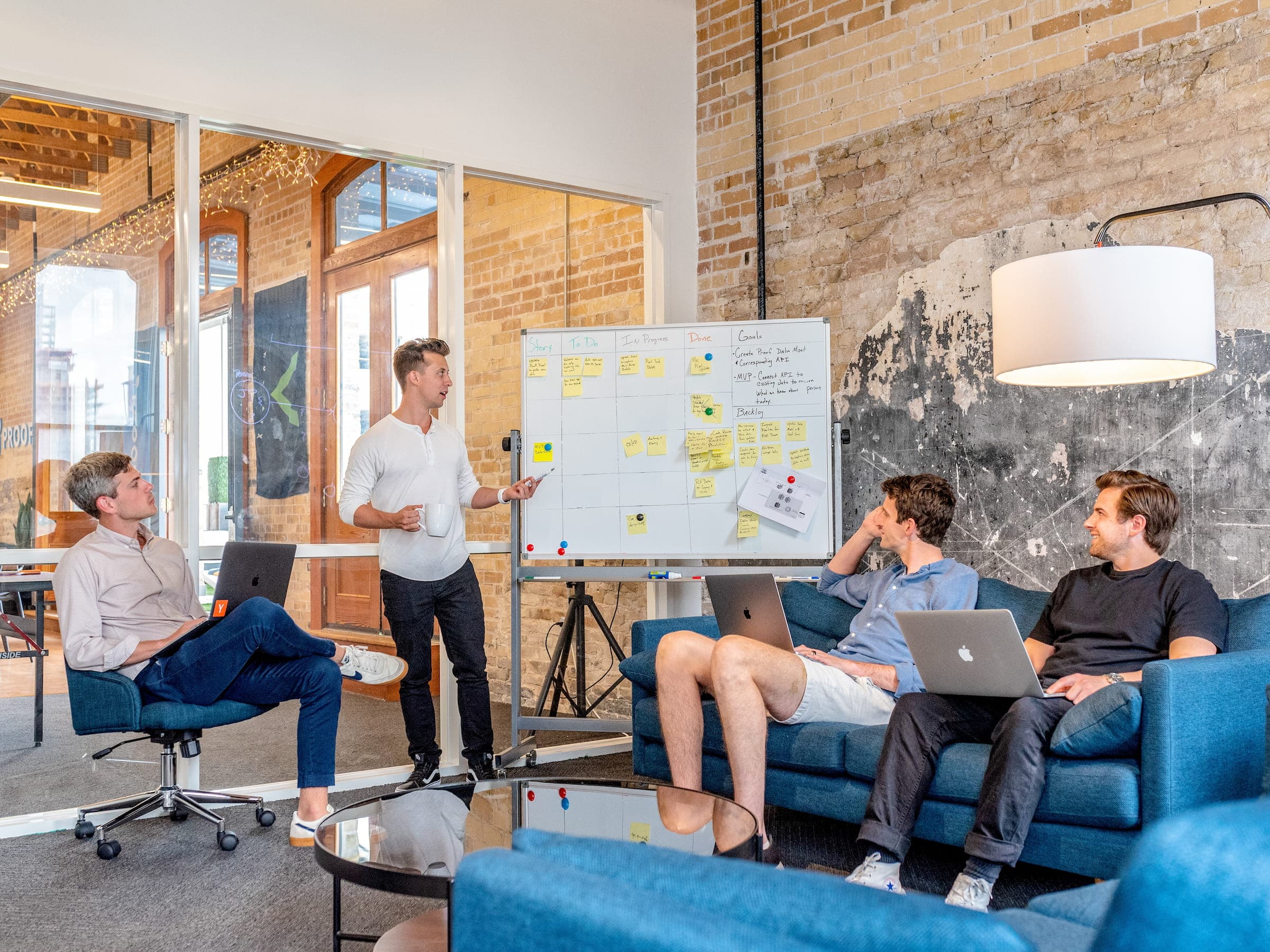 Team outlining video data needs on a whiteboard